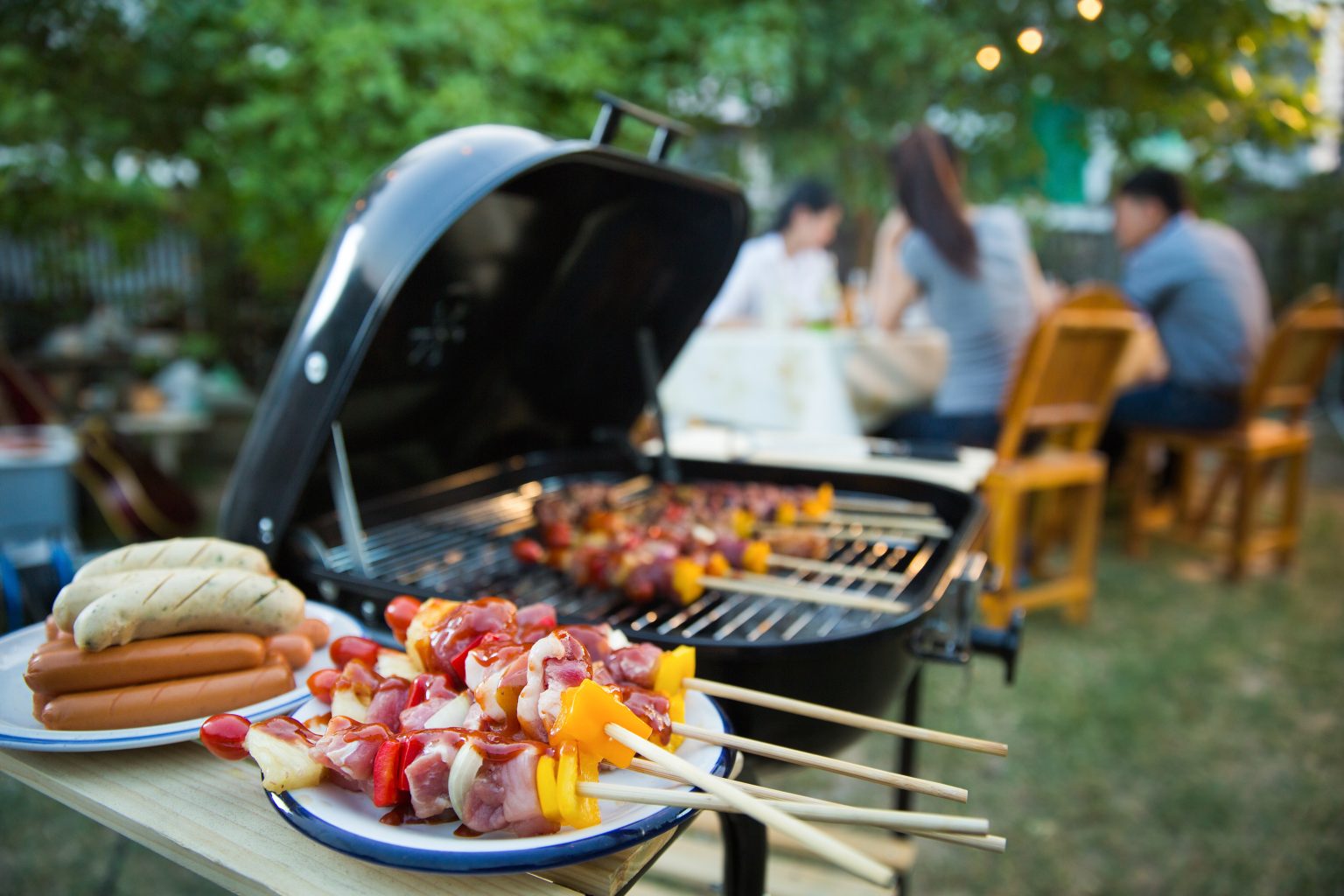 What BBQ cooking habit increases the risk of food poisoning?