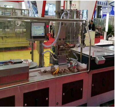 Full-automatic nine-granule suppository filling and sealing machine