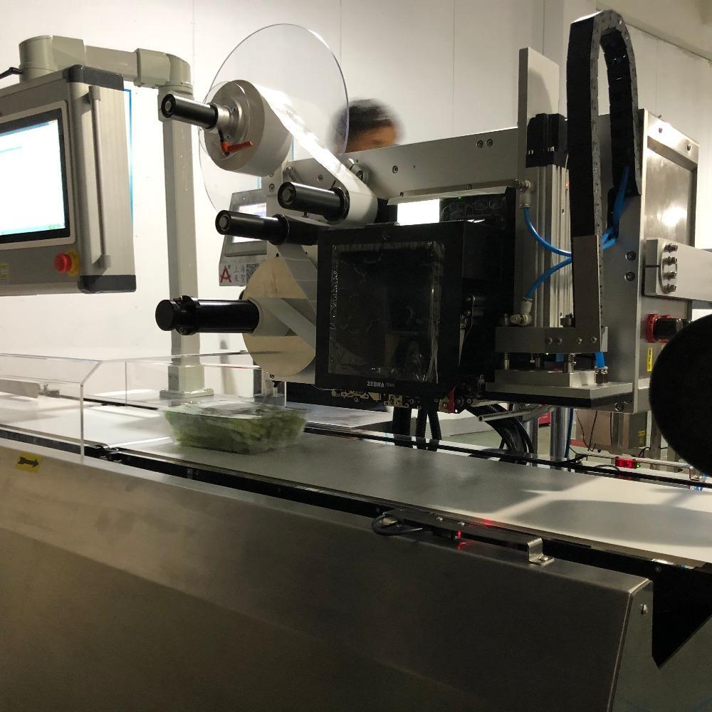 来贺自动打印贴标机械草莓盒装打标签