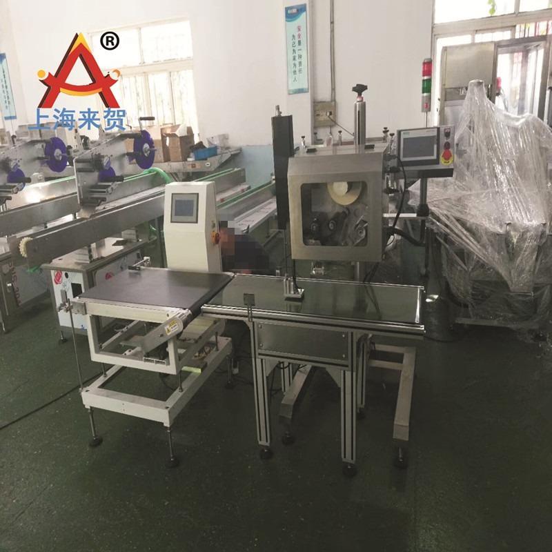 来贺自动打印贴标机械草莓盒装打标签